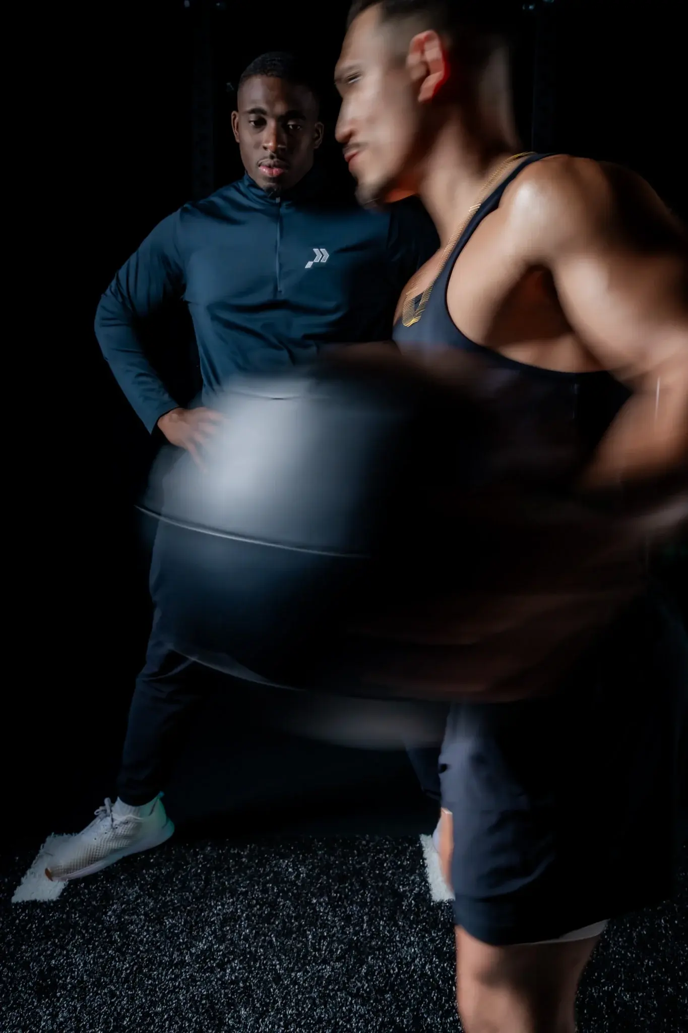 Medicine ball slam during athletic rehab on the clinic floor